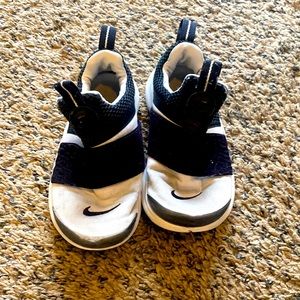 Used condition Nike Shoes size 12C. See pictures for worn areas.